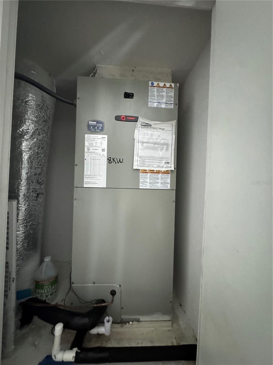 AC handler behind door in loft.