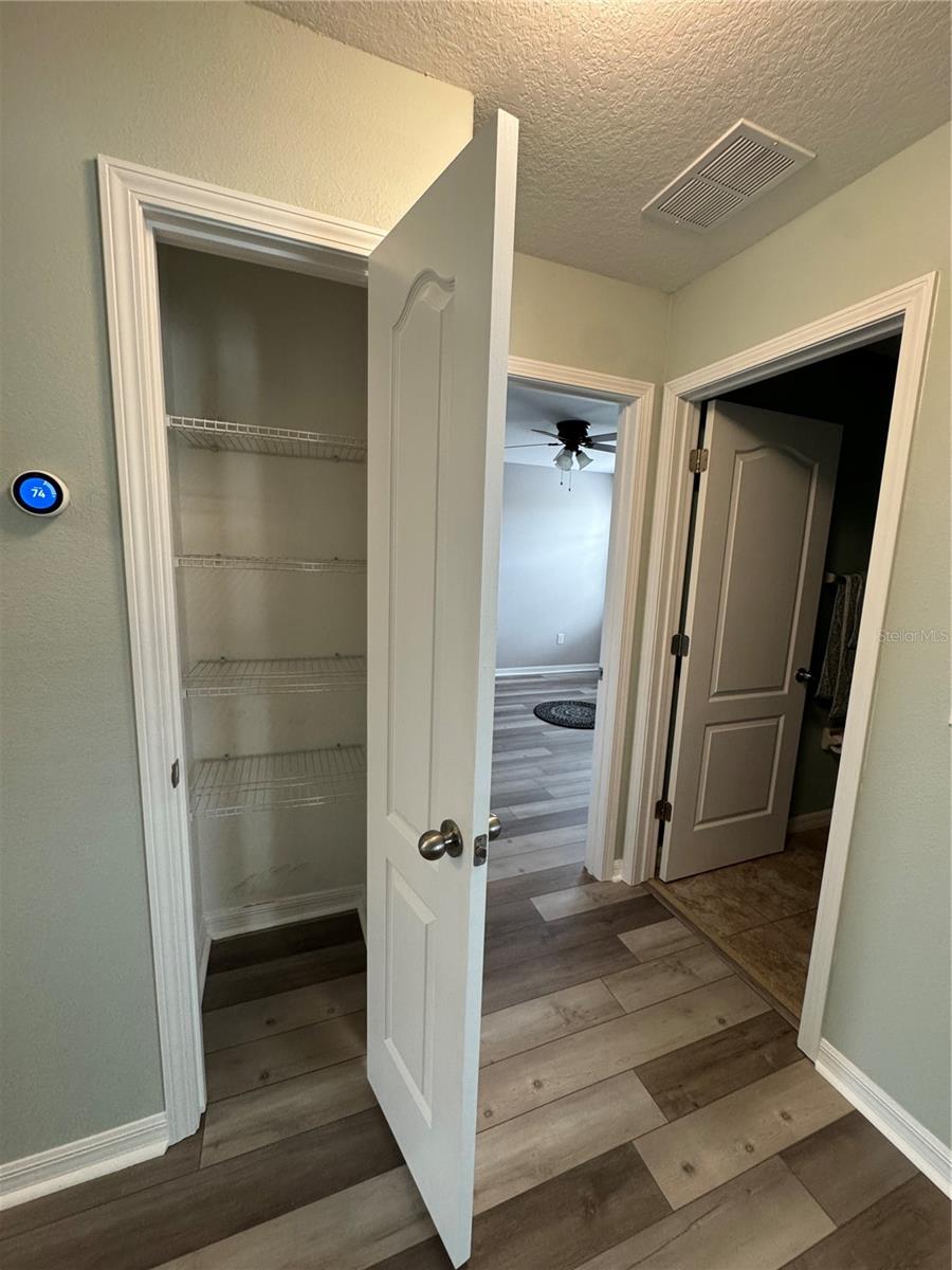 First upstairs bedroom to the left of the home with pond view.