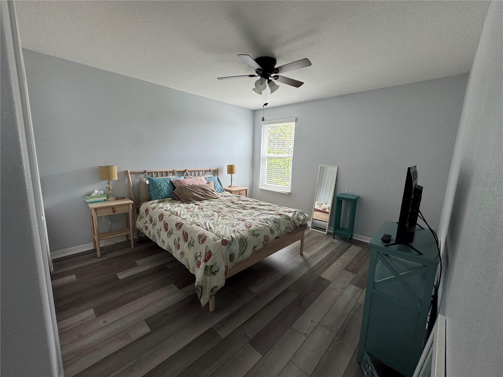 First upstairs bedroom to the left of the home with pond view.