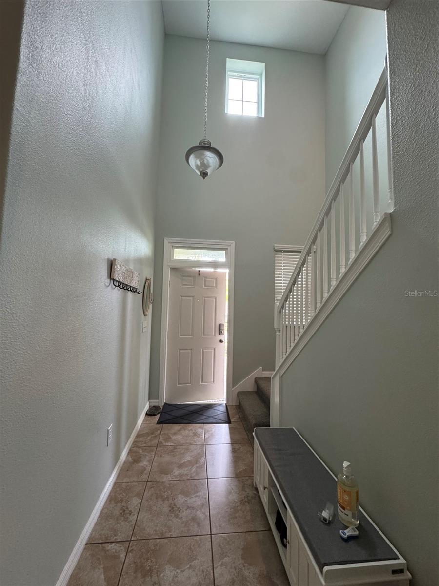 Front door and stairway view.