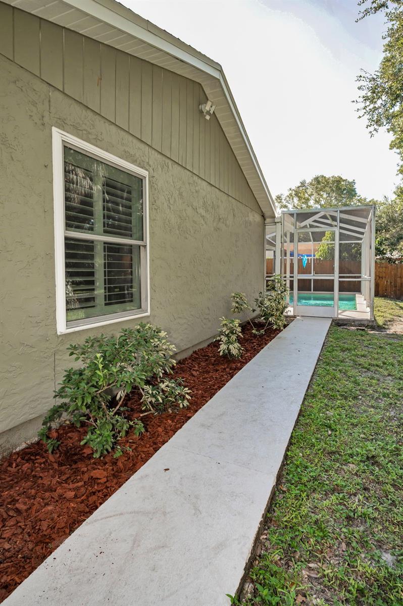 Side yard walkway to garage