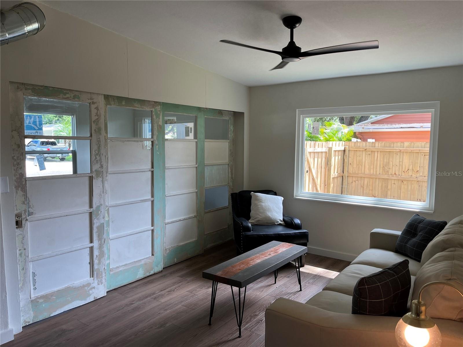 LIVING ROOM WITH DOOR WALL CLOSED