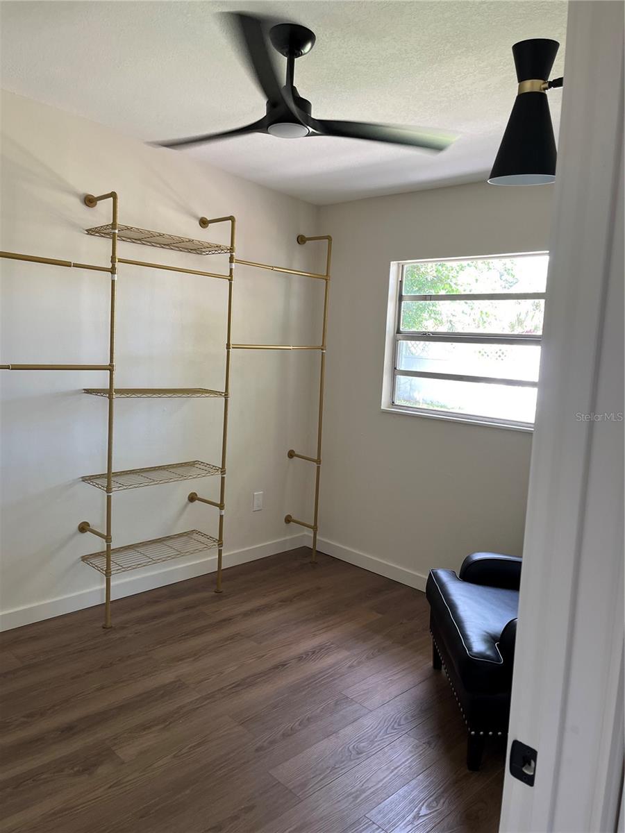 GUEST BEDROOM WITH WALL MOUNTED CLOSET/STORAGE