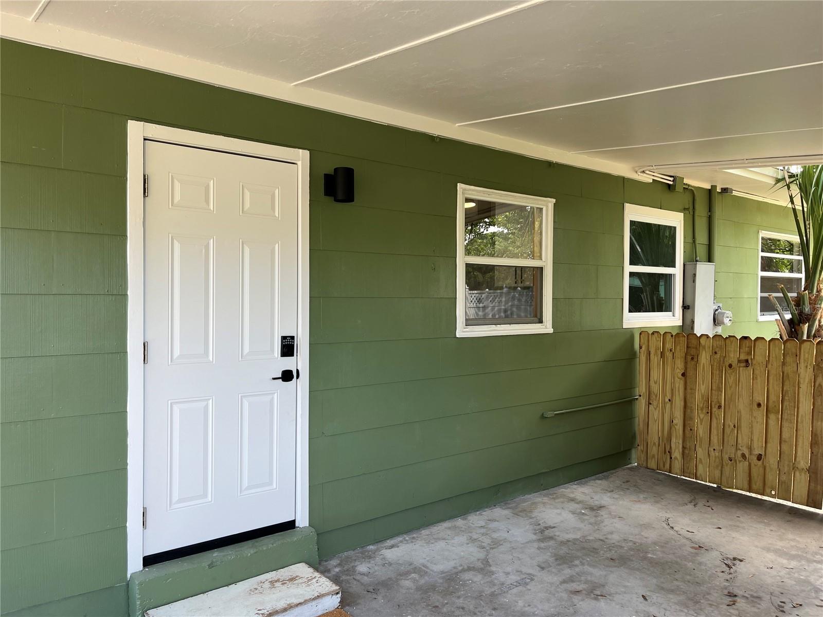 CARPORT ENTRY DOOR INTO KITCHEN