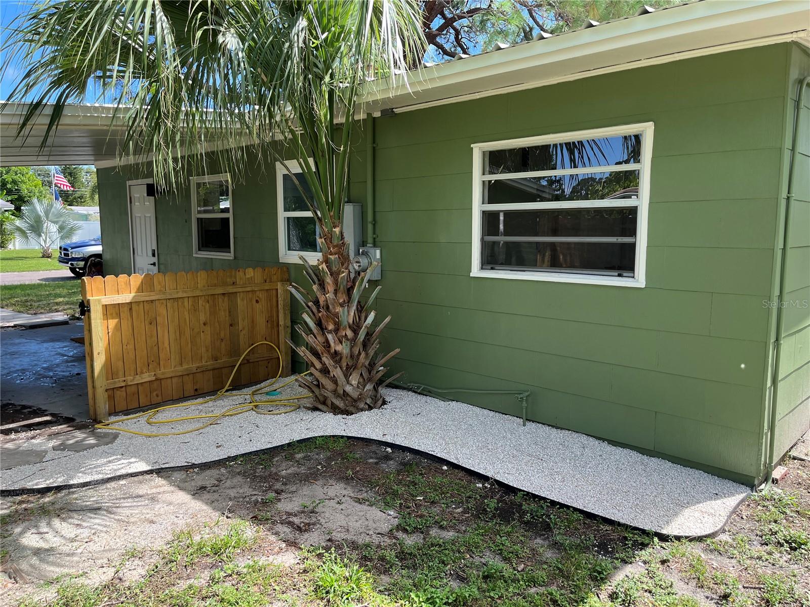 BEHIND CARPORT GATE