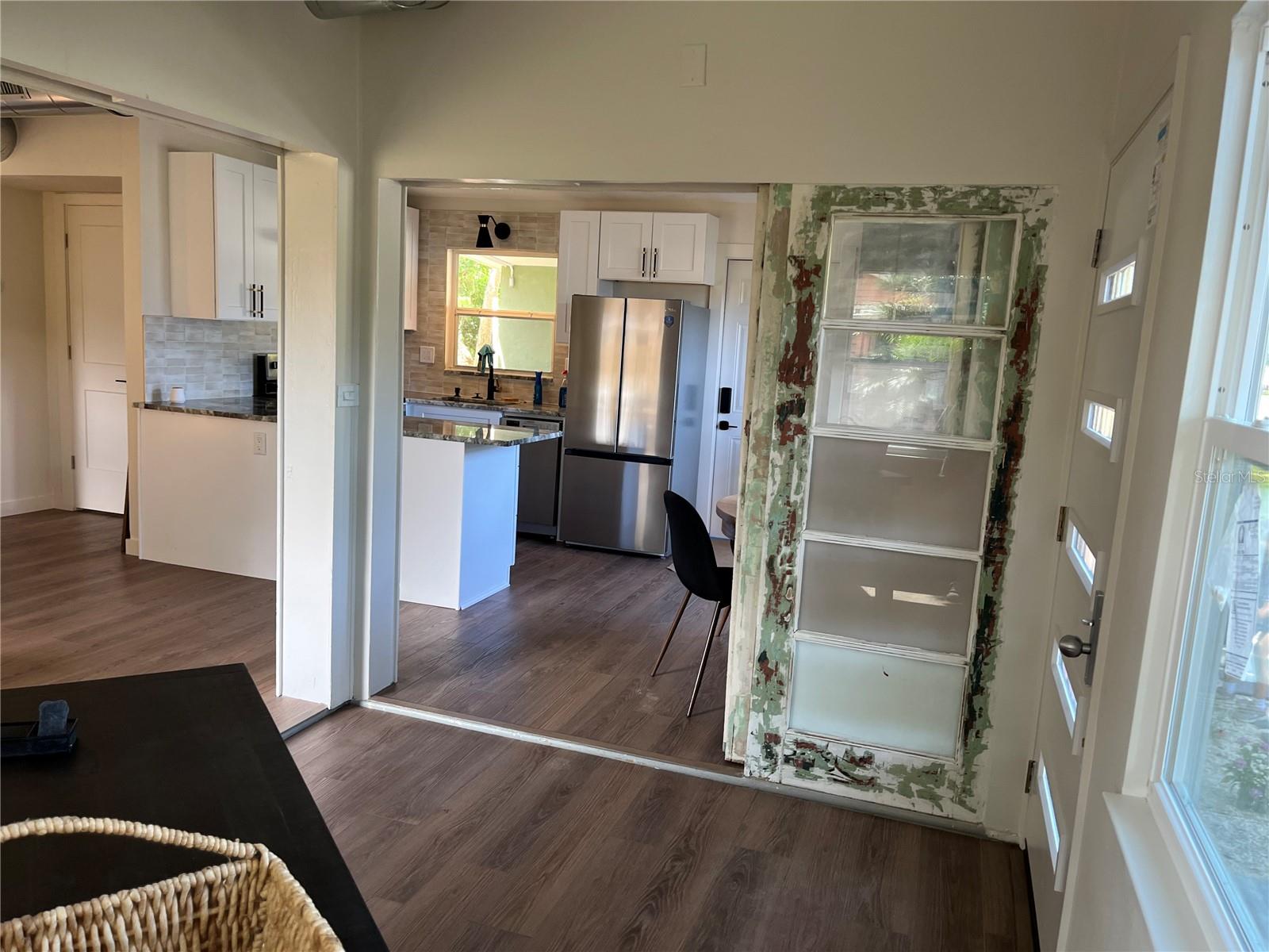 VIEW OF KITCHEN FROM FRONTIN FLEX SPACE