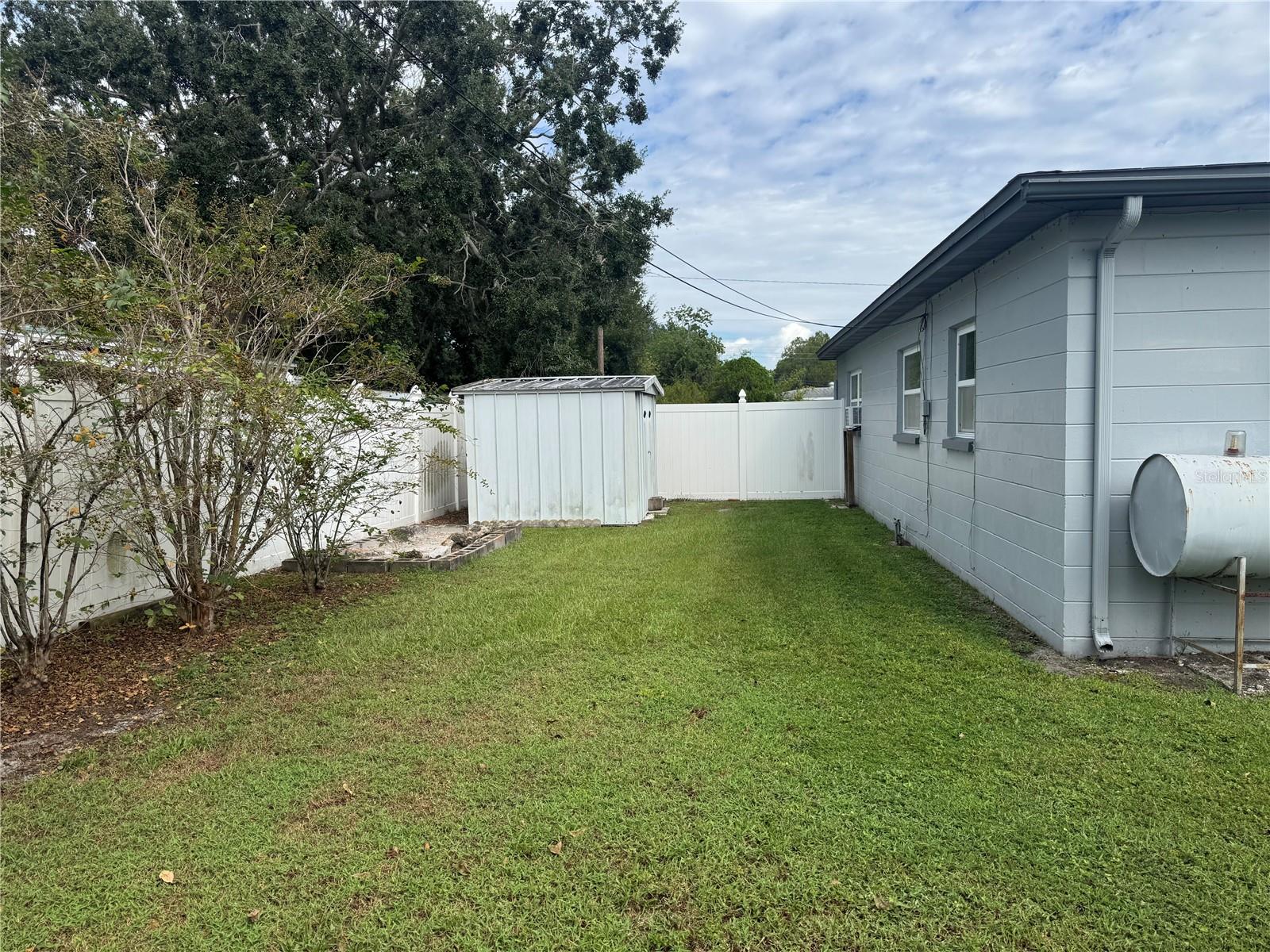 Left side view of the backyard toward the street.