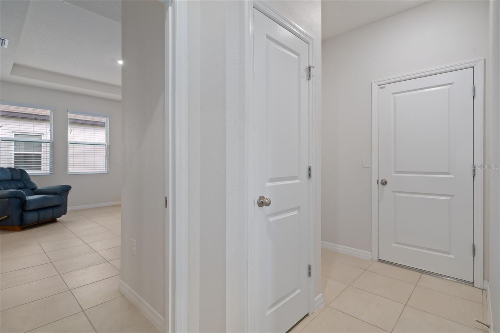 Entry to in law suite-game room- flex room-home office.  What would you use it for?