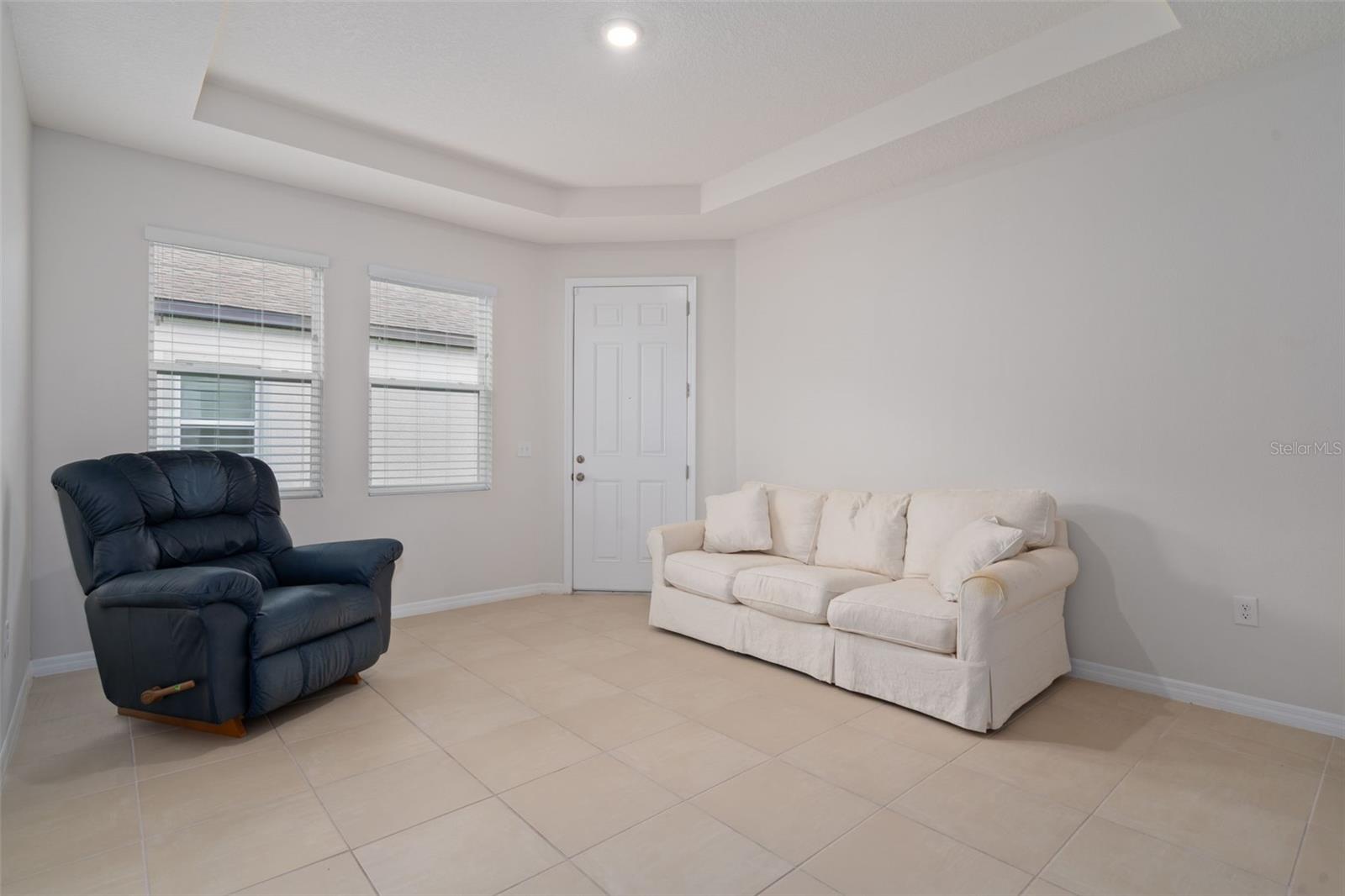 Separate living area or living room of in law suite. Flex space.