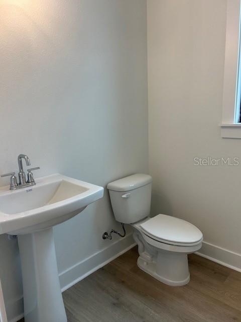 First Floor 1/2 Bath with Pedestal Sink