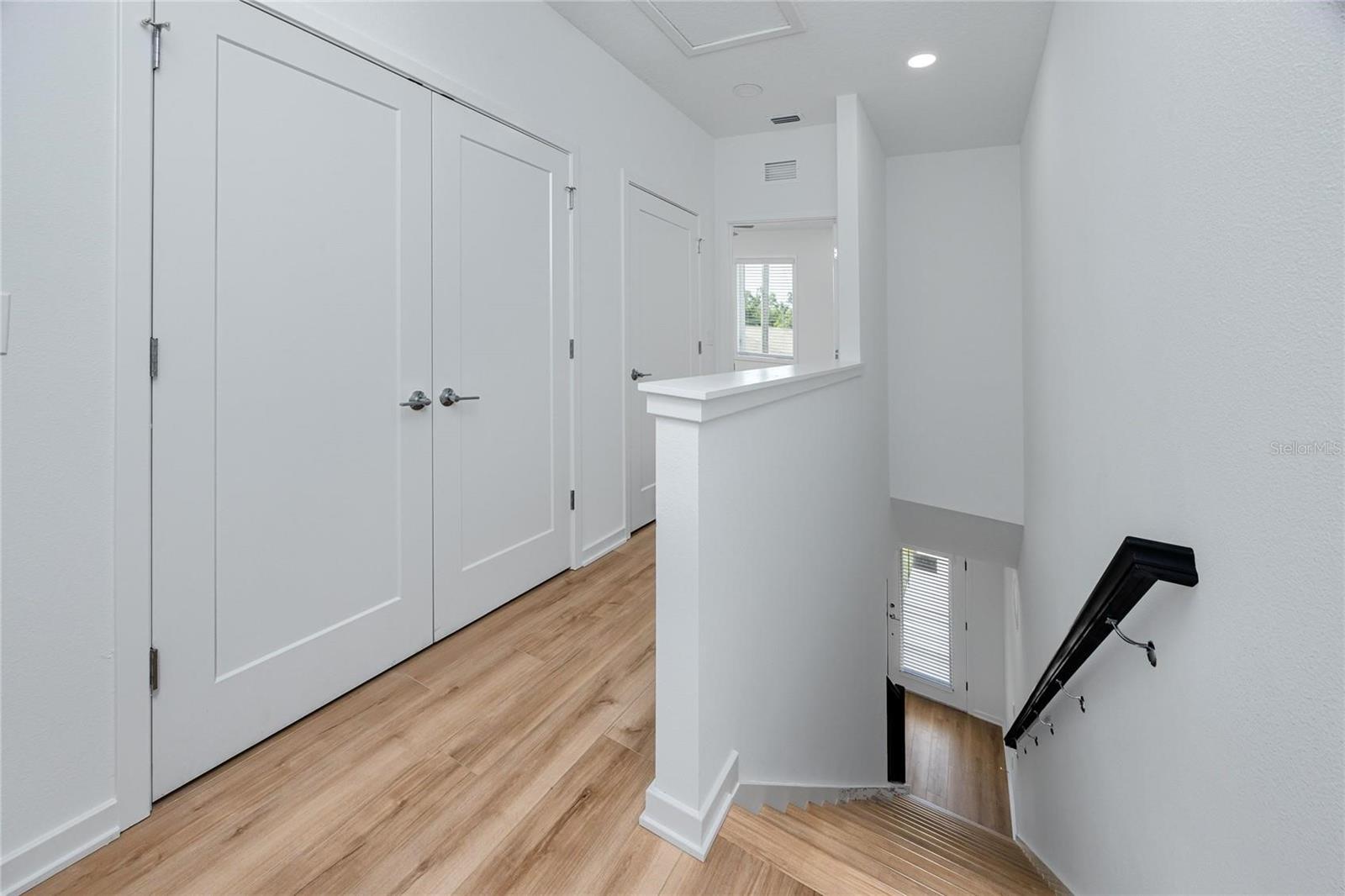 Hallway between bedrooms.