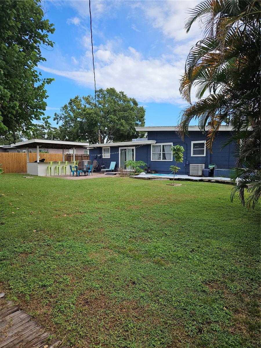 Back yard with BBQ area