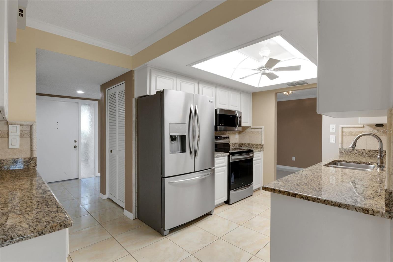 SMUDGE FREE REFRIGERATOR  - notice coat closet!