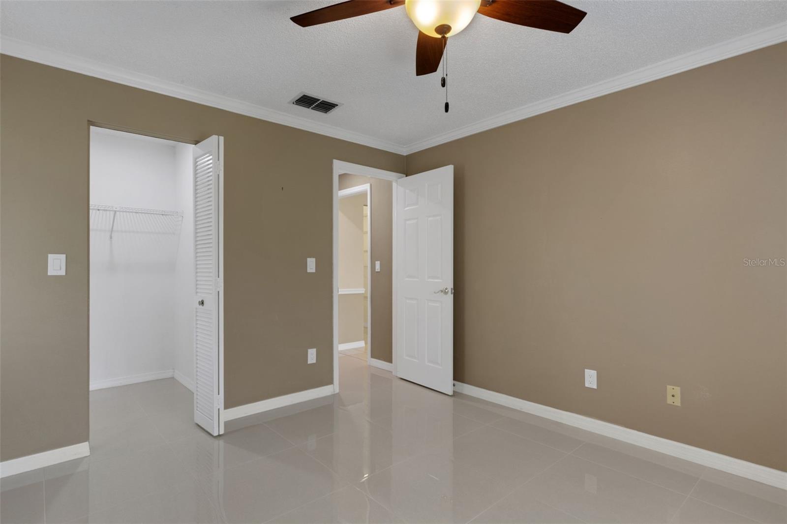 Guest bedroom also has a walk in closet