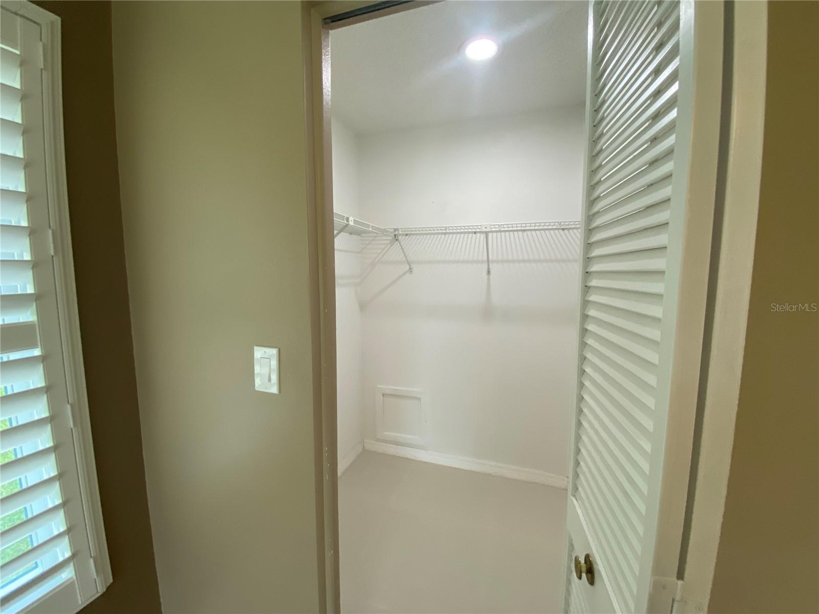 Guest bedroom walk in closet