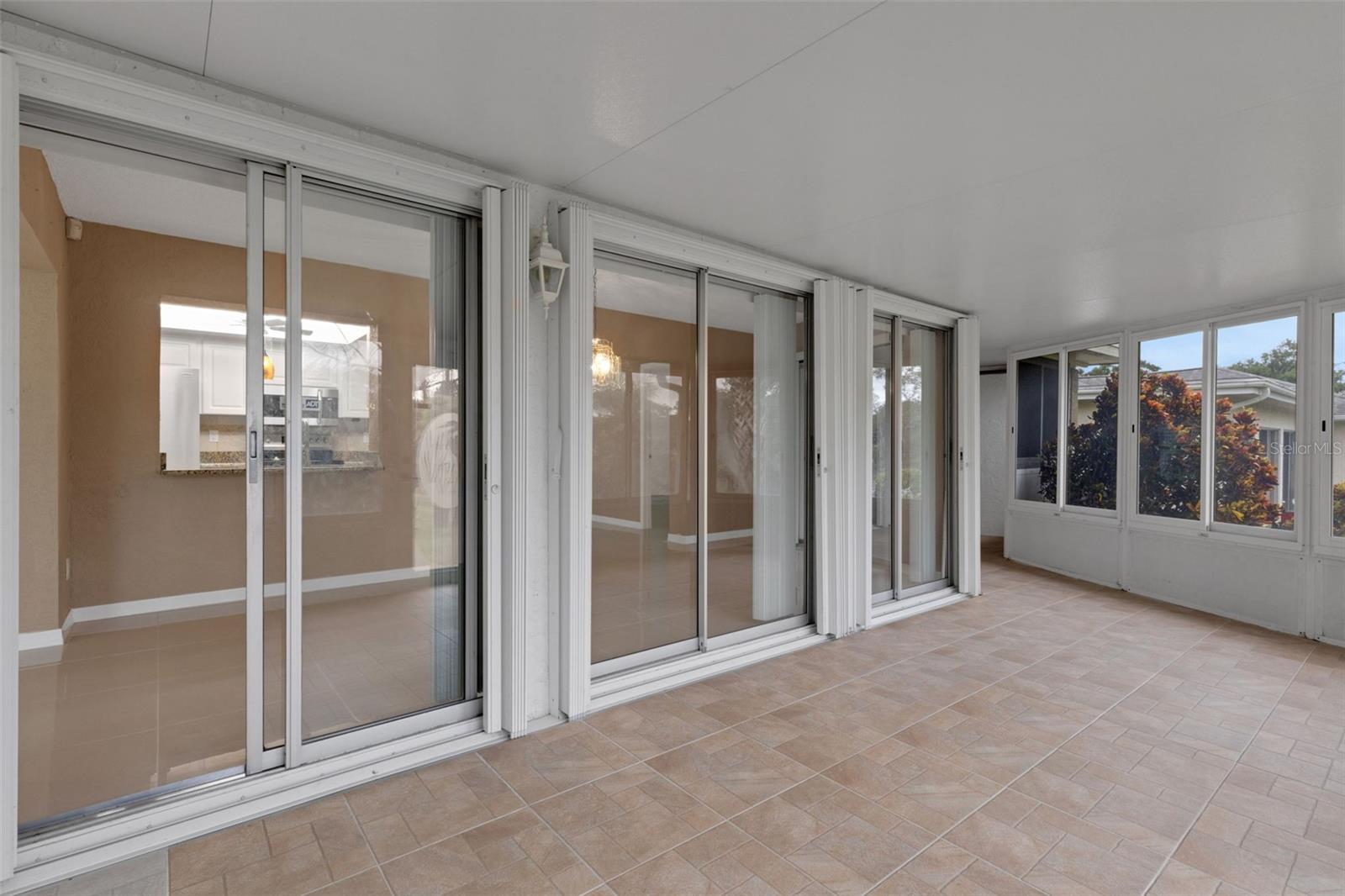 Year round Florida Room with 5 sets of sliders