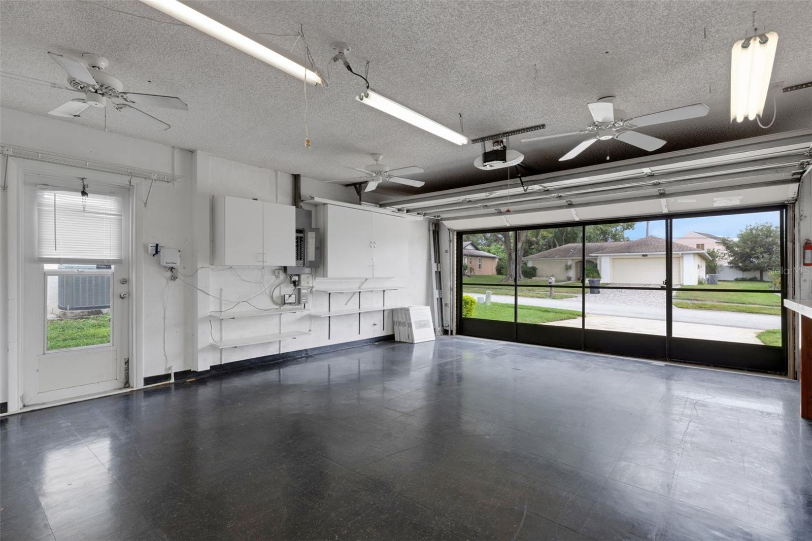 Oversized 2 car garage with Hurricane garage door supports