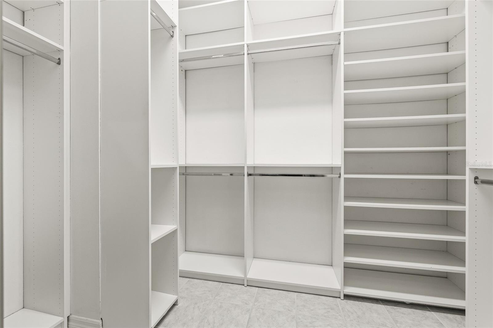 Amazing custom closet in the primary bedroom.