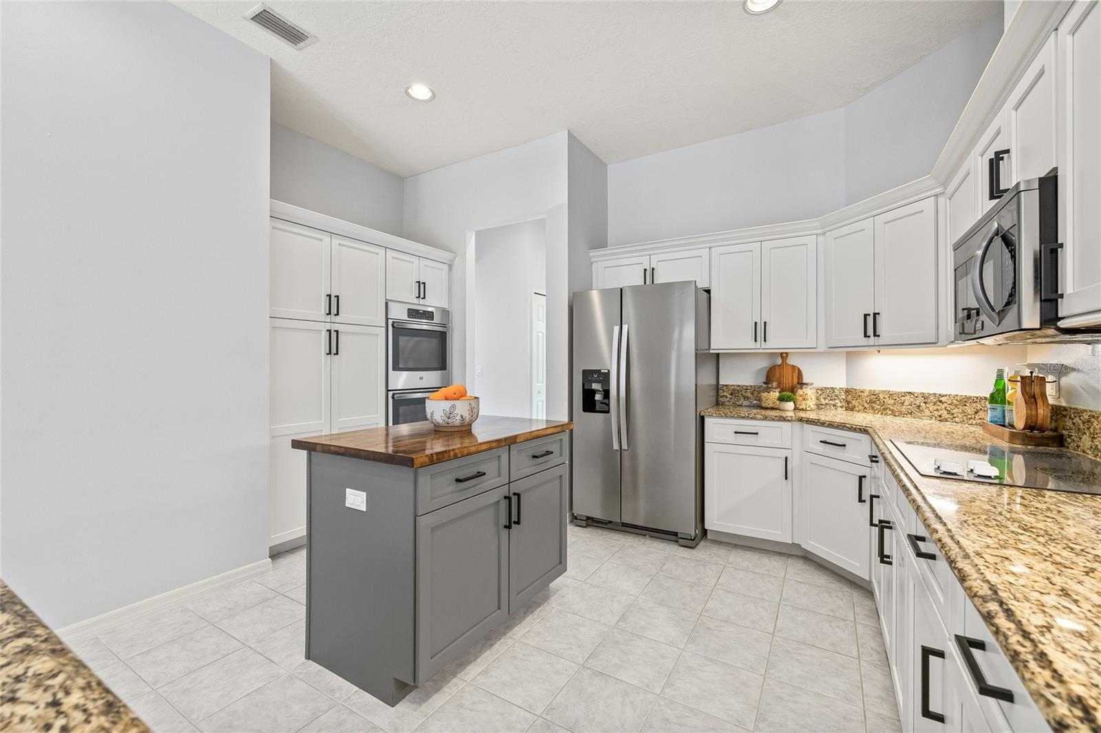 Excellent flow in the kitchen for cooking together.