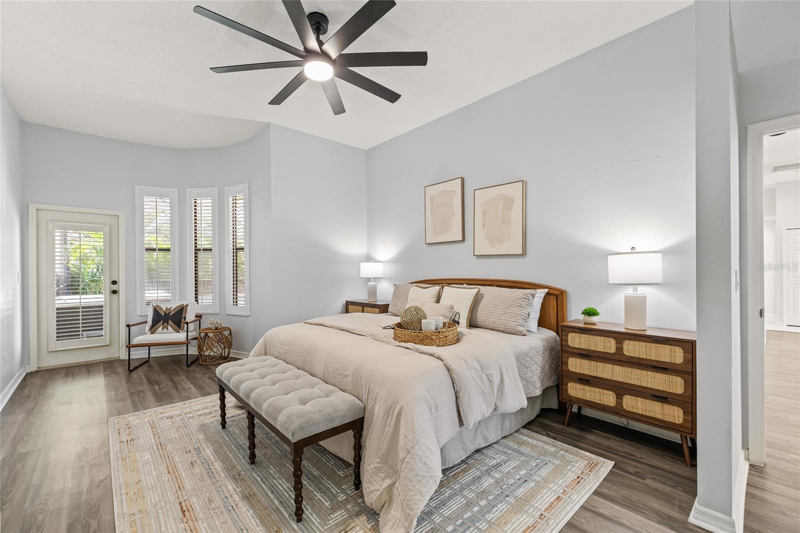 Primary bedroom is spacious and tucked away by itself with the split floorplan.