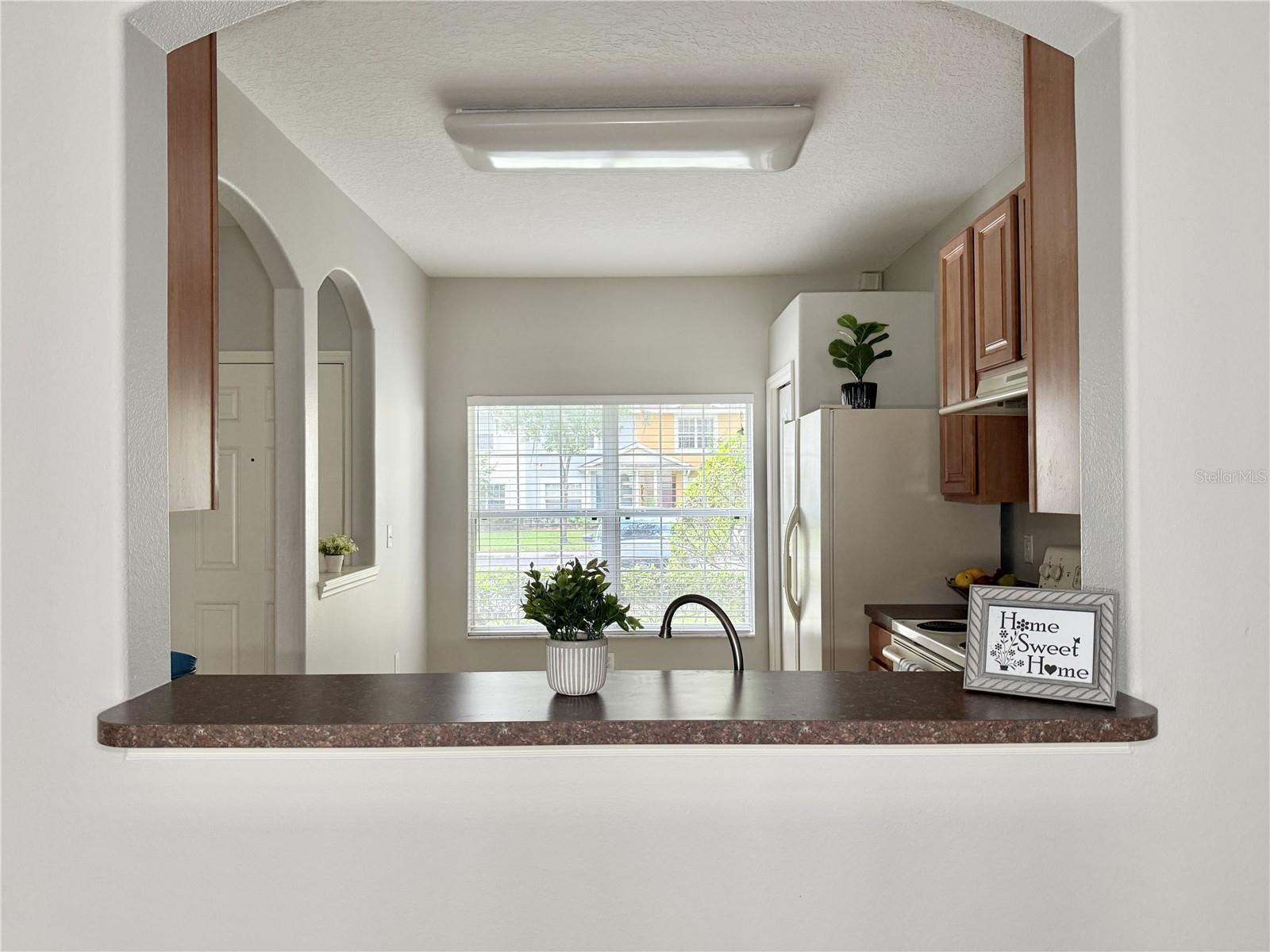 Kitchen and Dining Area Breakfast Bar and Pass Thru