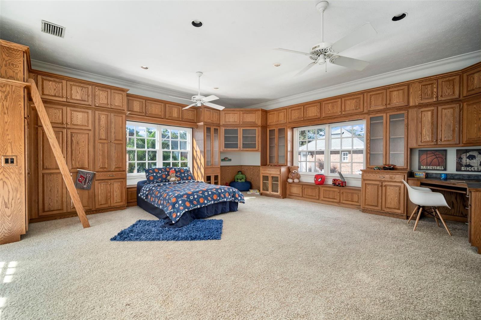 WALL OF FRENCH DOORS TO POOLSIDE BALCONY