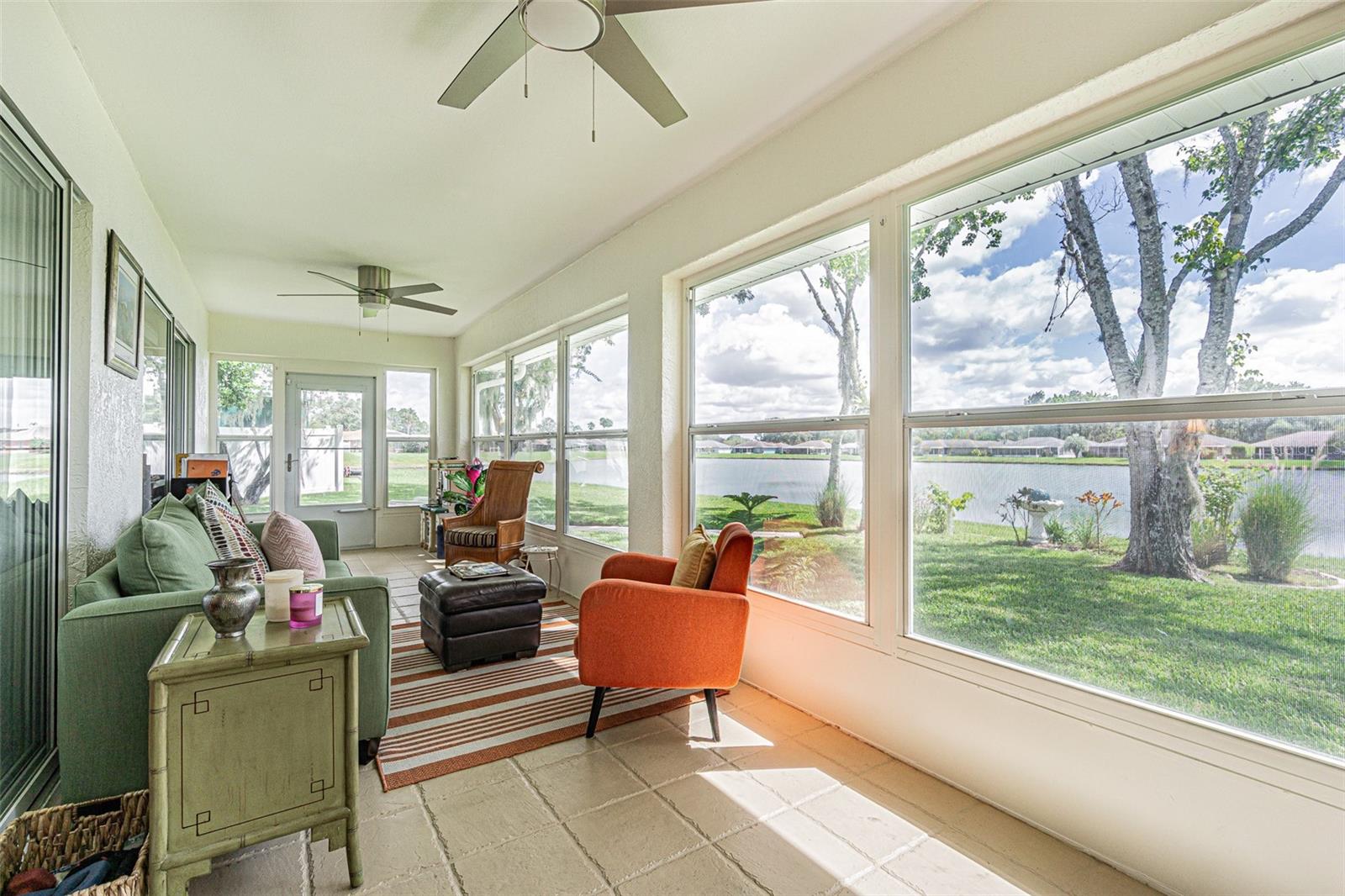 Enclosed SUNROOM with water views!