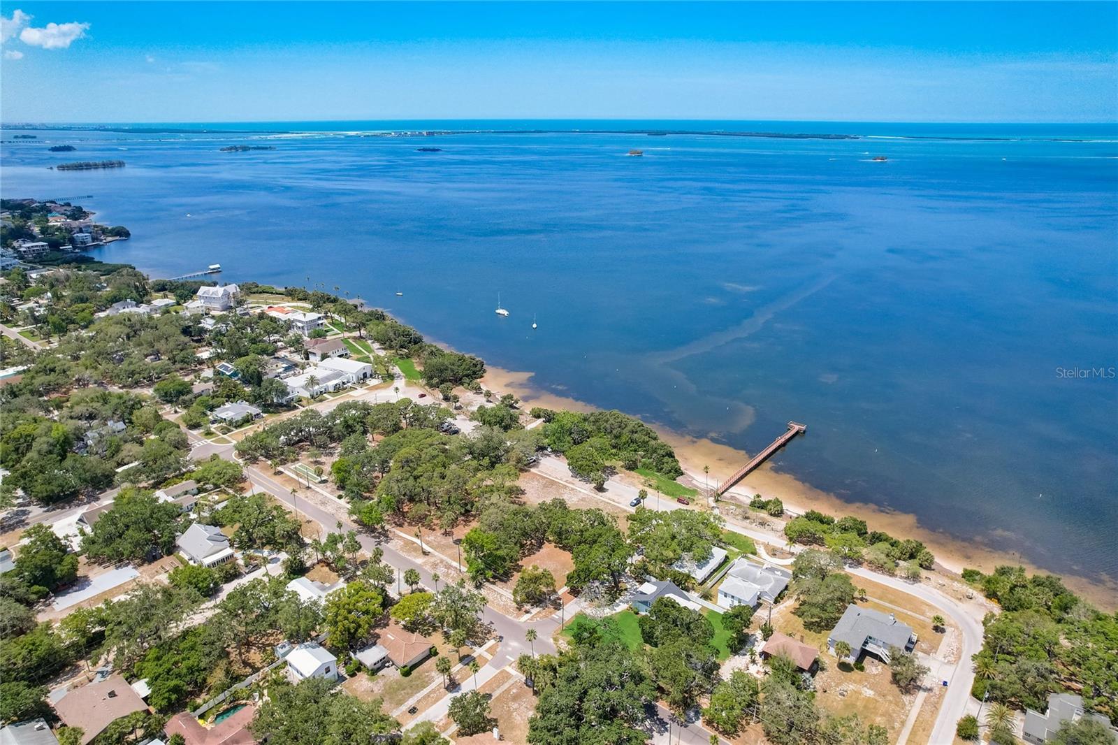 Community park land across from the shore and  new pier buing built