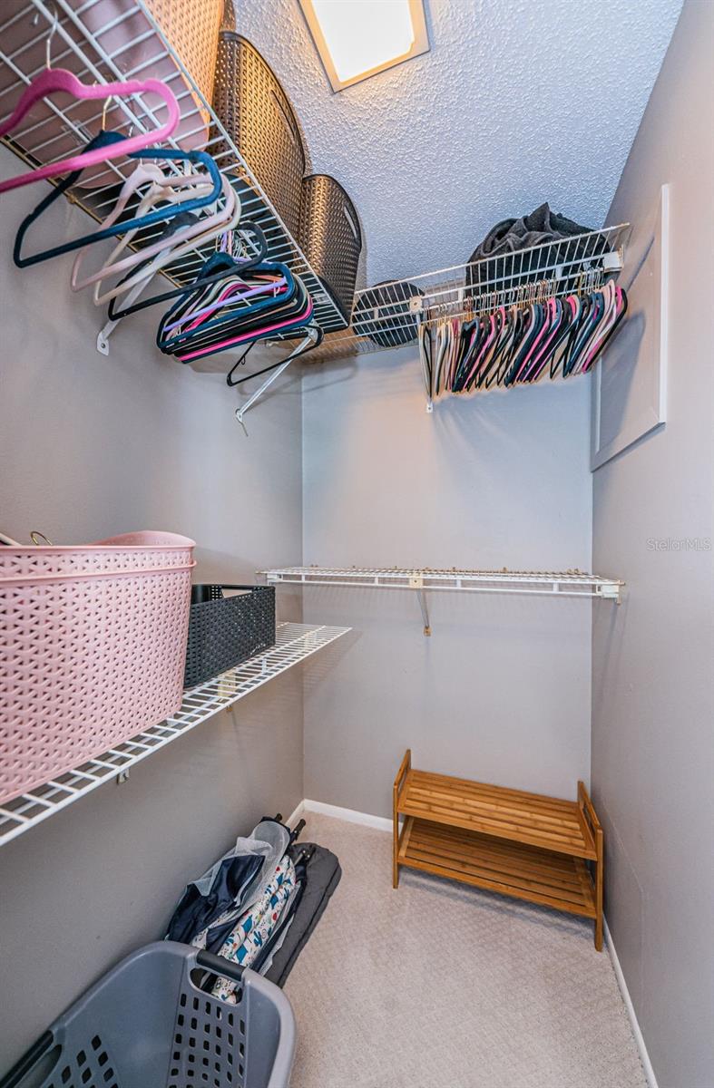 Guest bedroom walk in closet