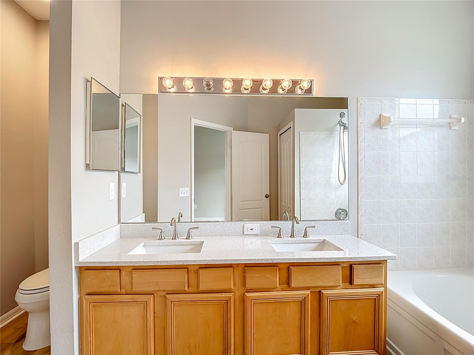 Primary Bath - new quartz counter, new sinks, faucets, toilet