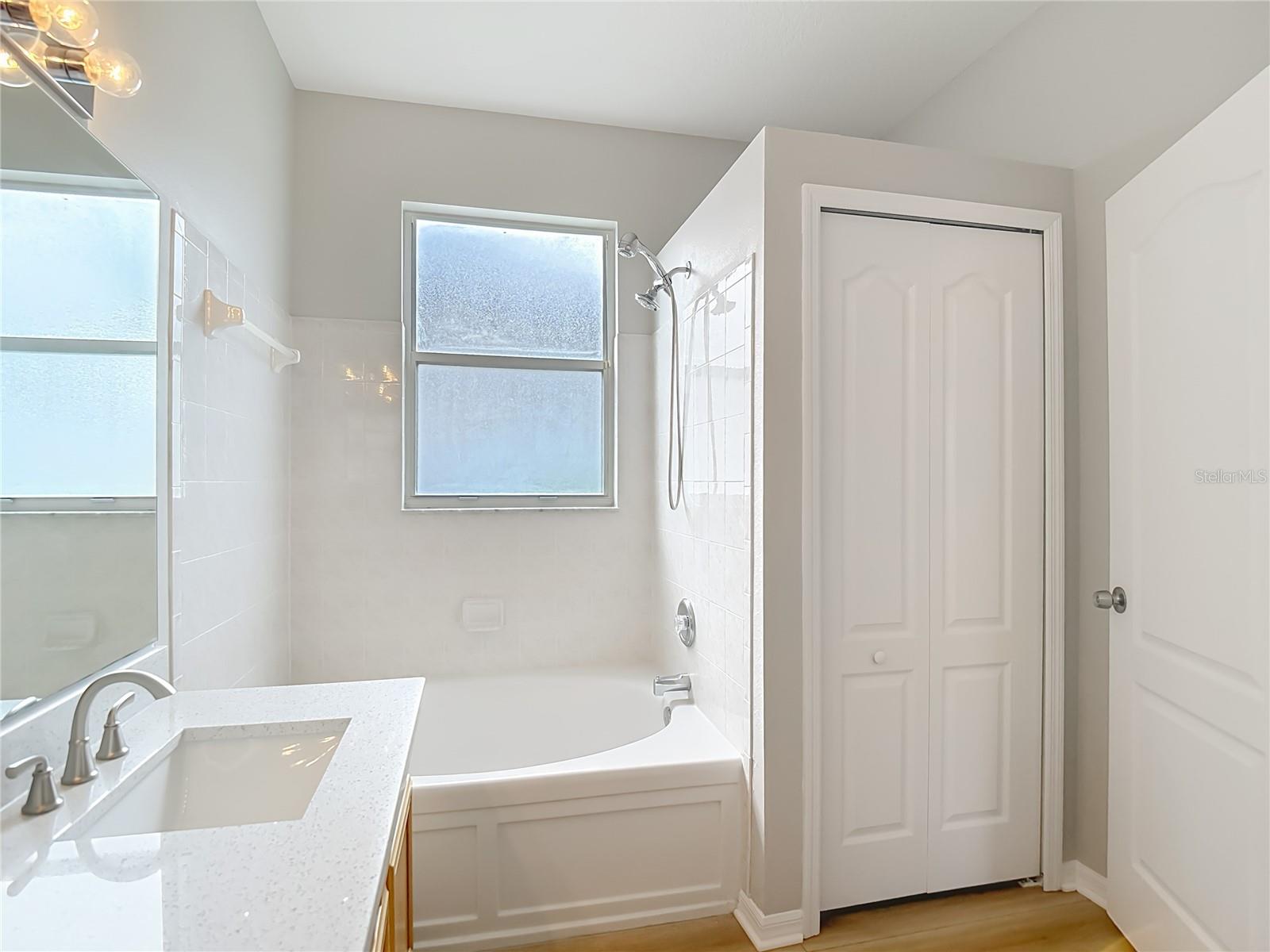 Primary Bath - new quartz counter, new sinks, faucets, toilet