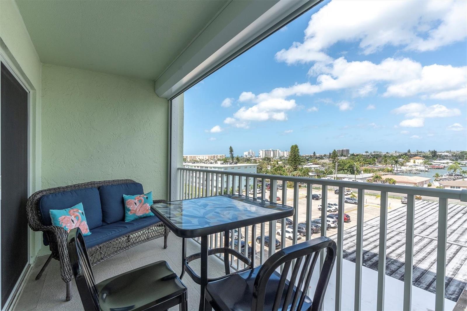 Balcony has water and sunset views