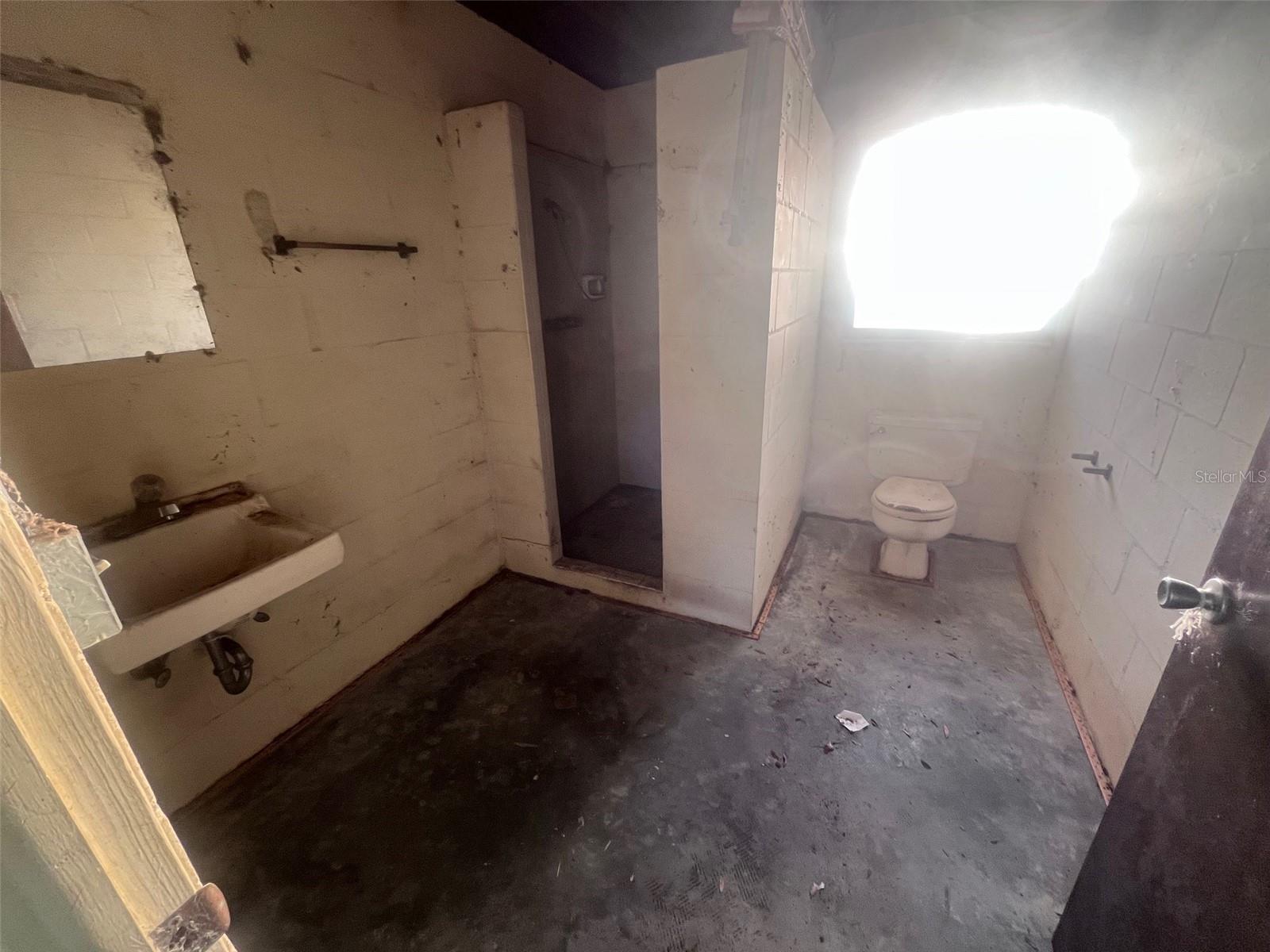Un-permitted bathroom of garage