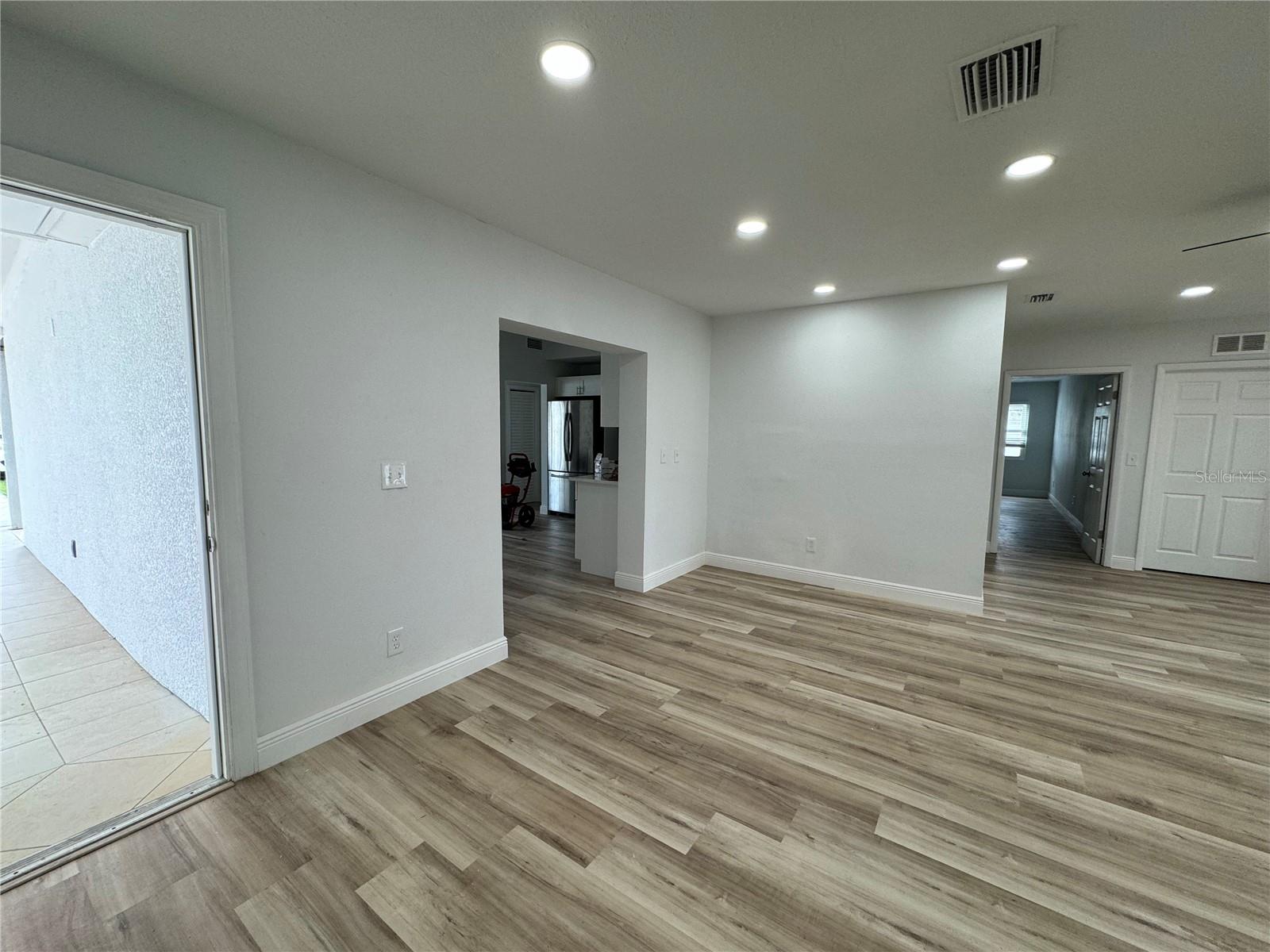 second living room and dining room area with private entrance