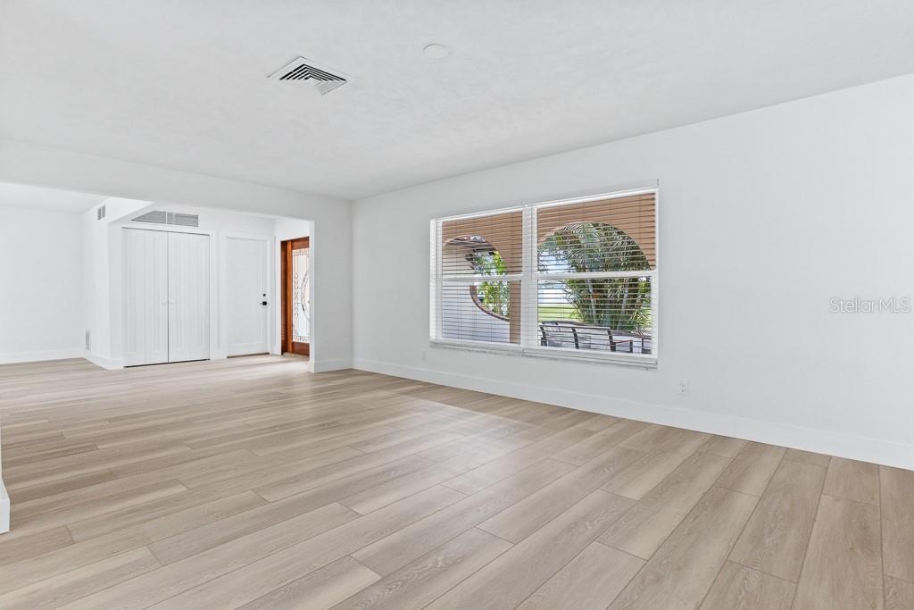 Brand new wood-look tile flooring throughout