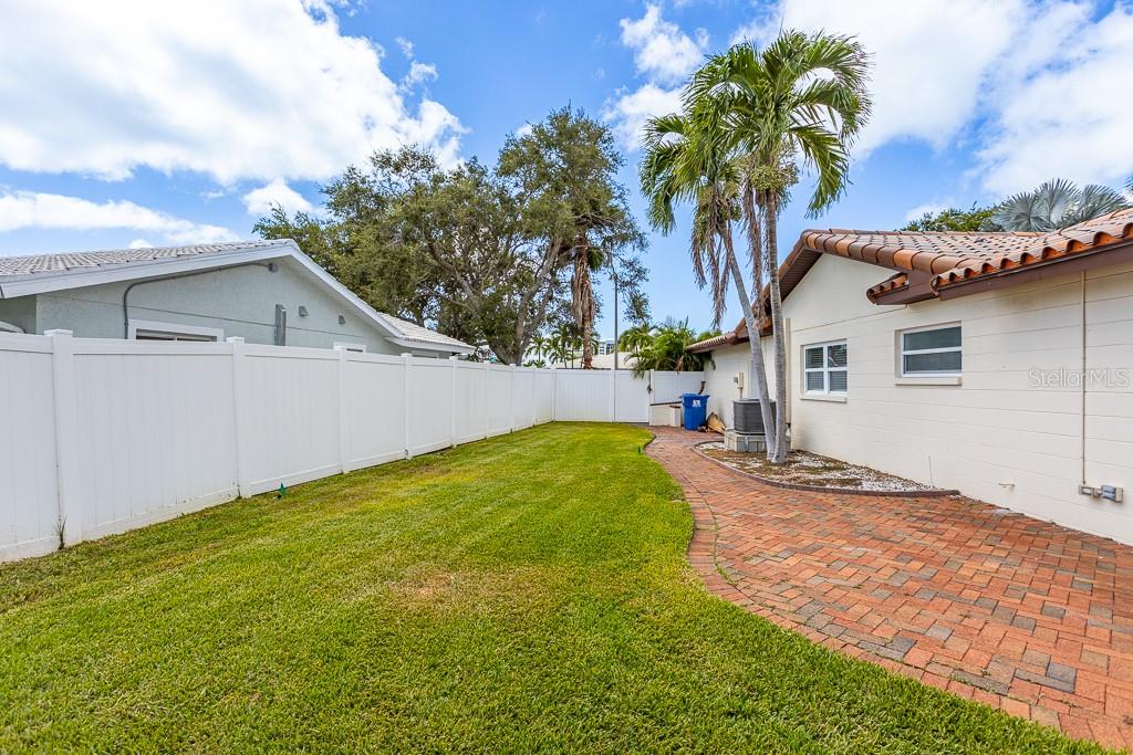 Side yard with plenty of room for a pool