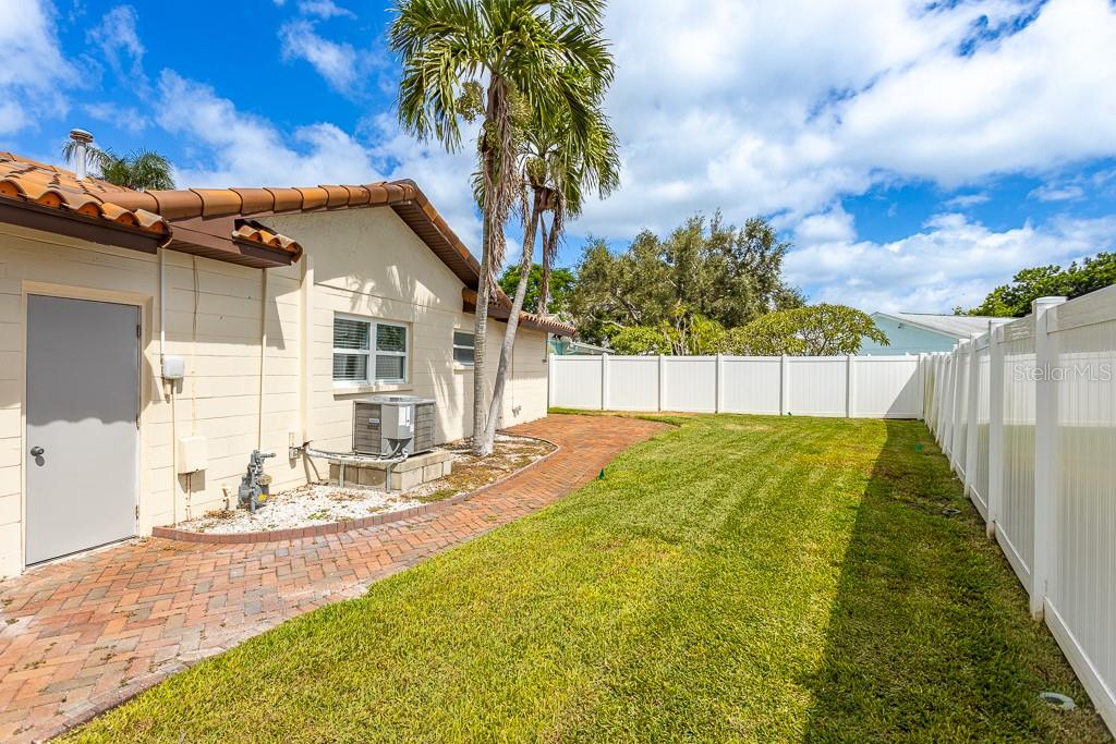Side yard with plenty of room for a pool