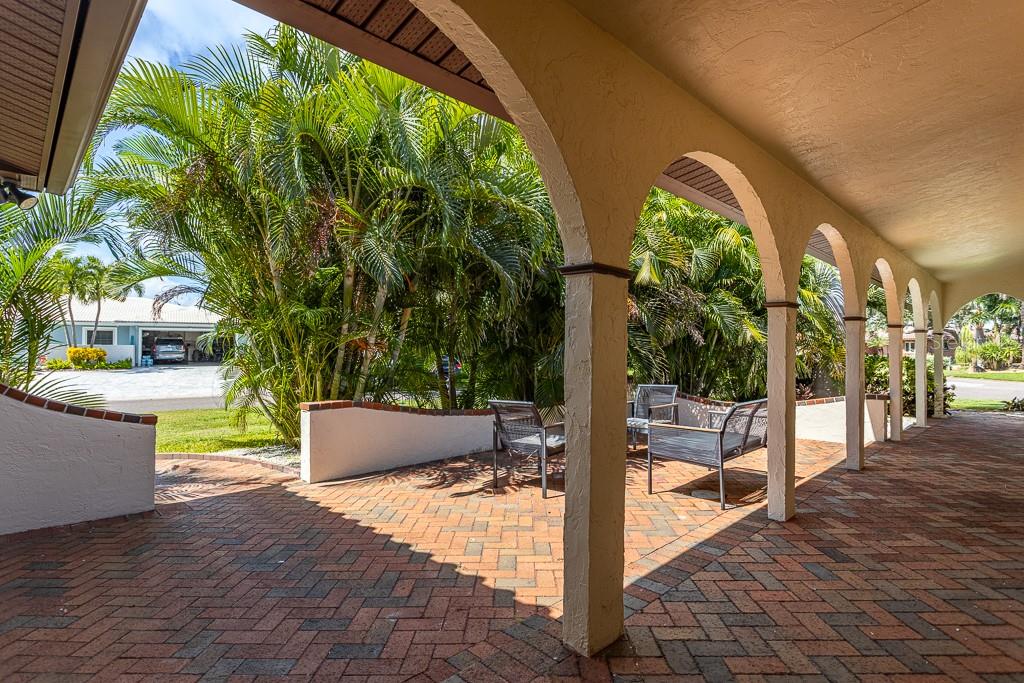 Lush foliage creates a private entry to front doors.