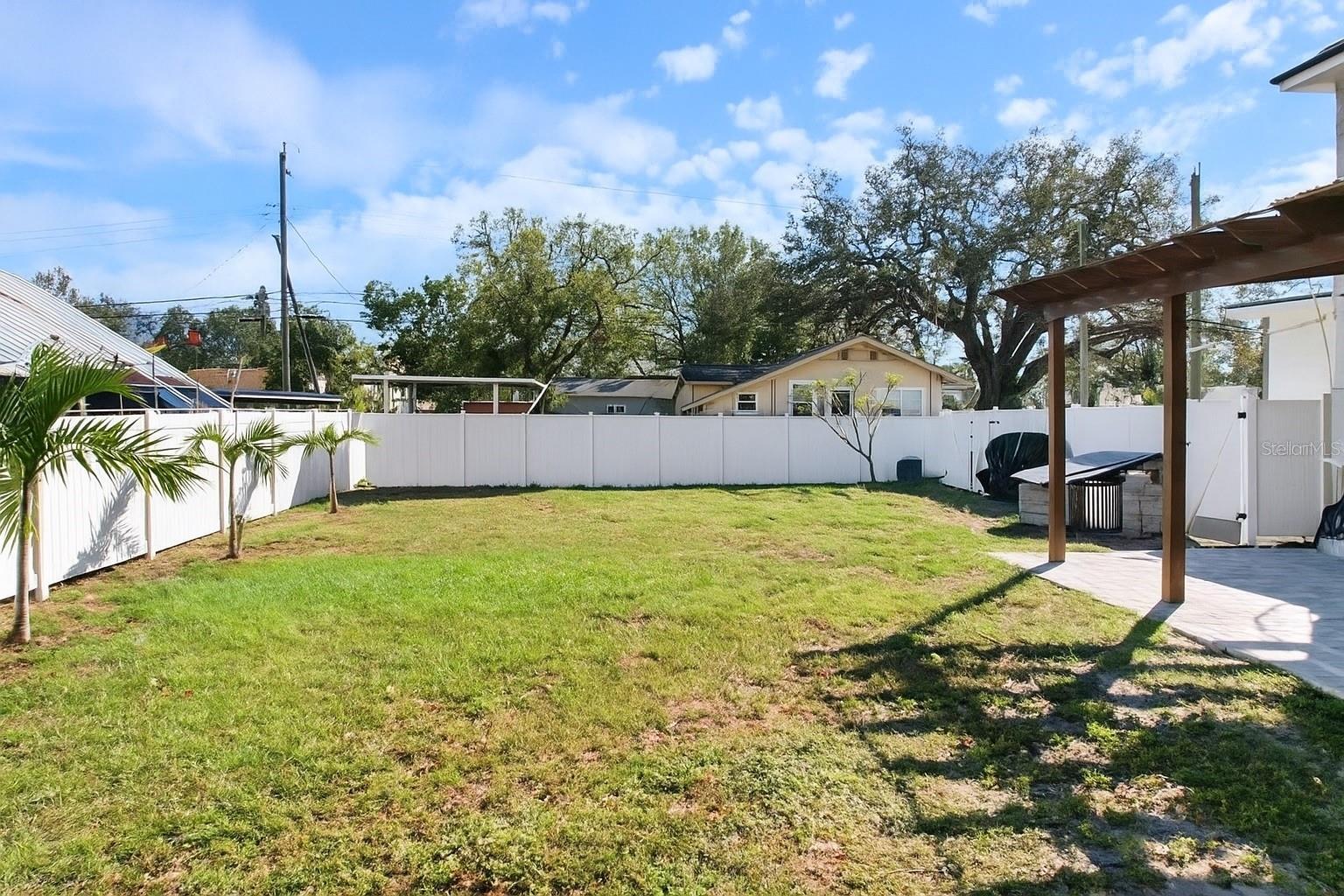 Beautiful white vinyl fence surrounds your property for ultimate privacy