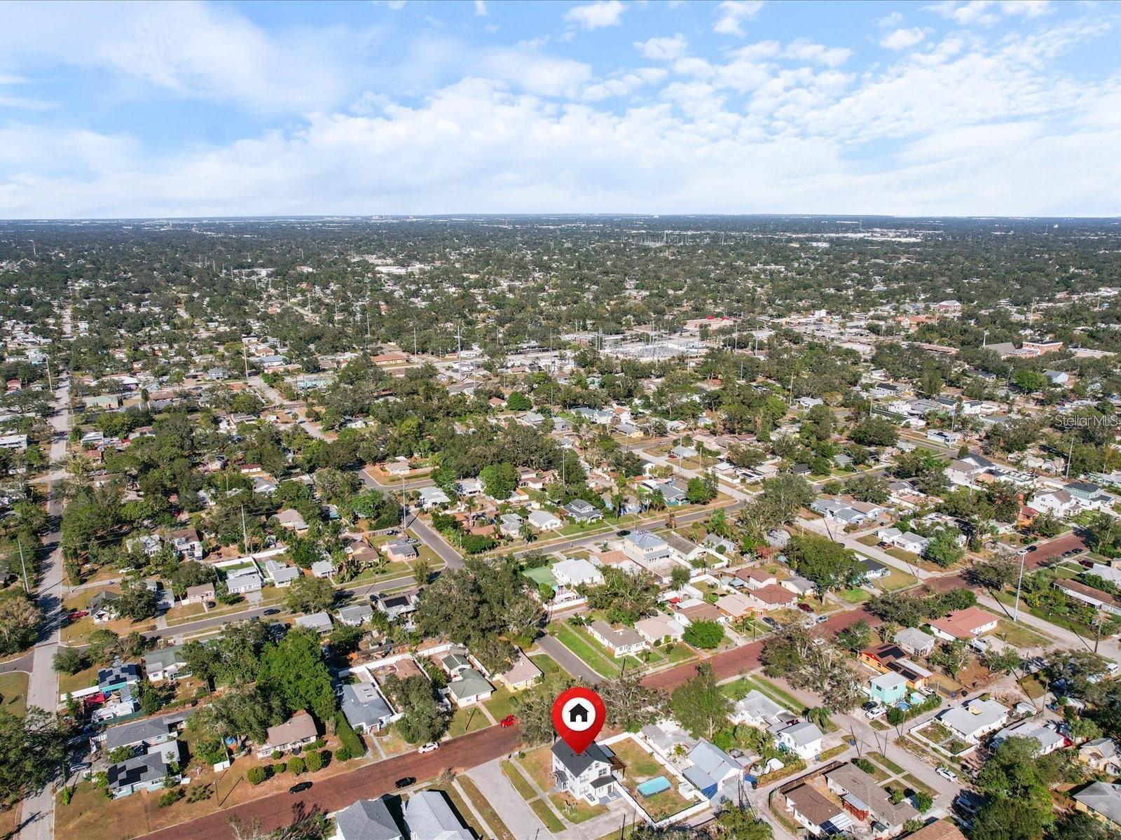 A beautiful brick paved street leads you down to your new home!