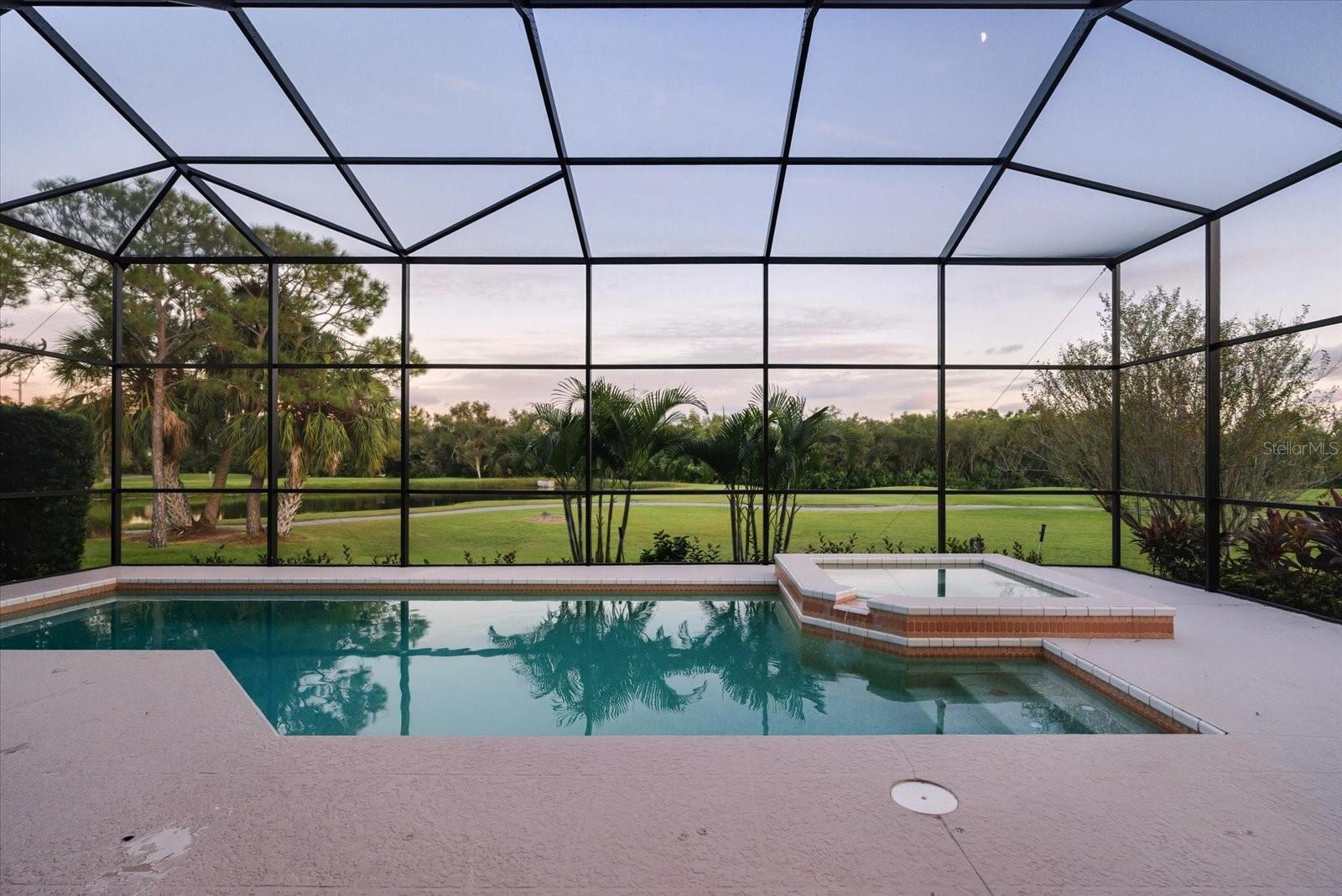 Golf Course Front Home with Wooded & Water Views