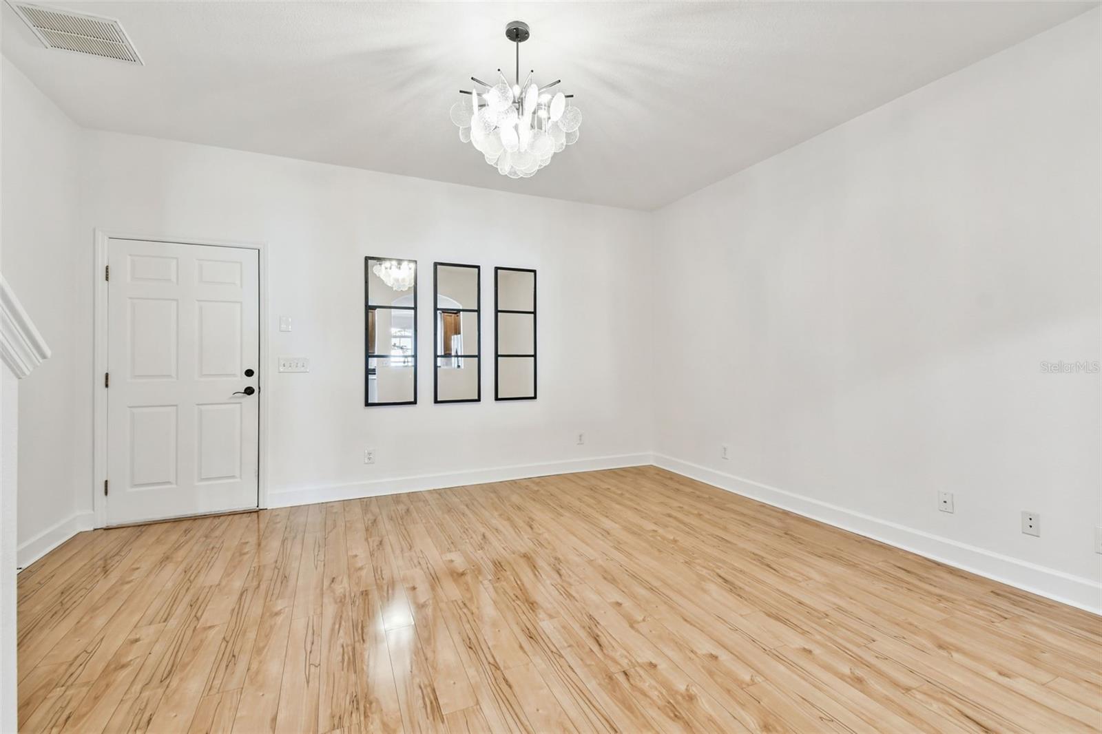 Family / Dining  Room - Door to Garage