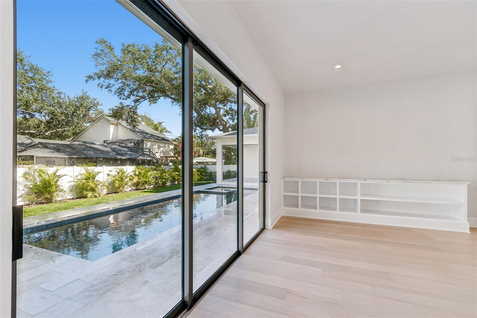 Views of the pool from media room