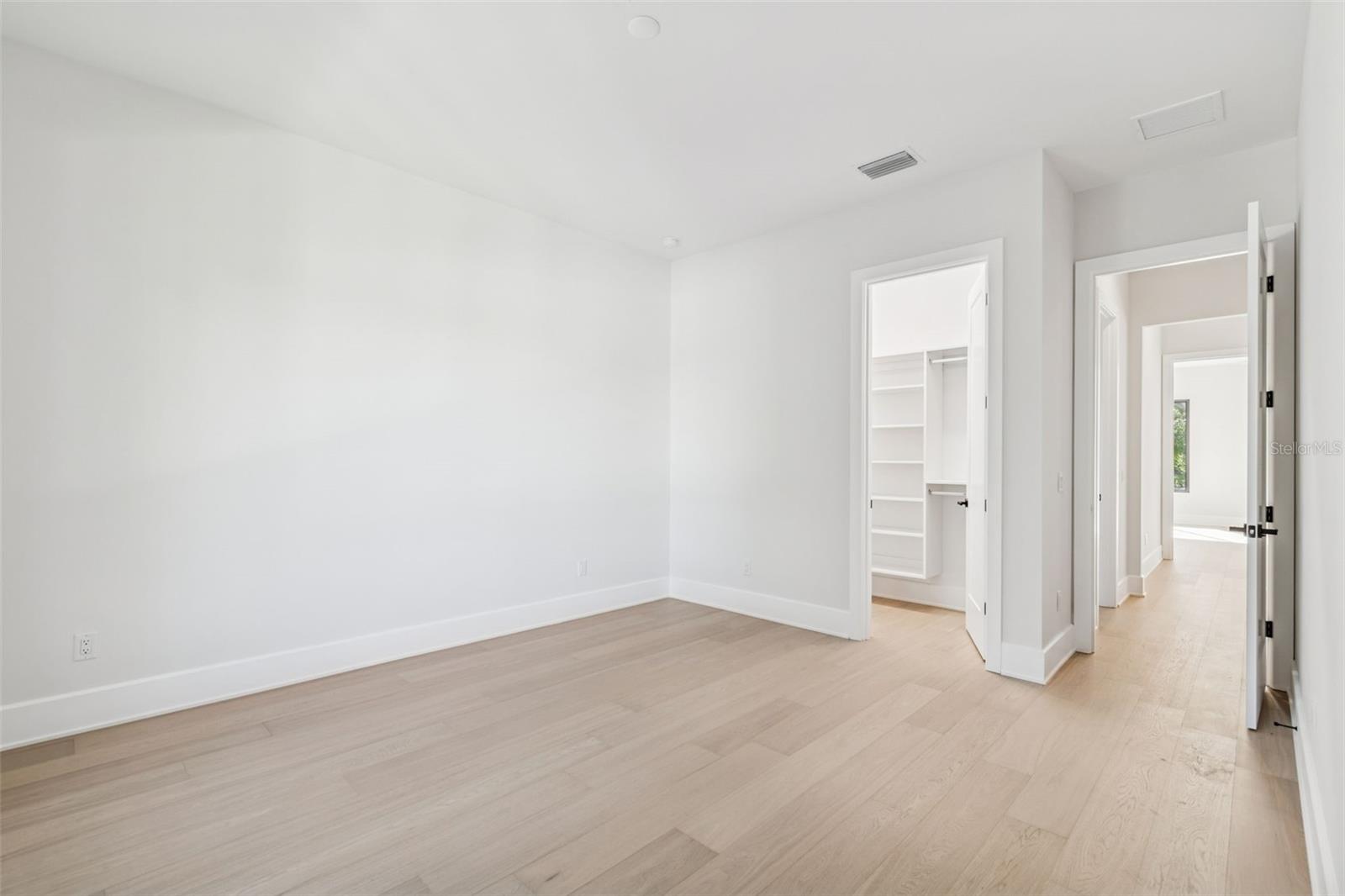 5th bedroom with walk-in closet