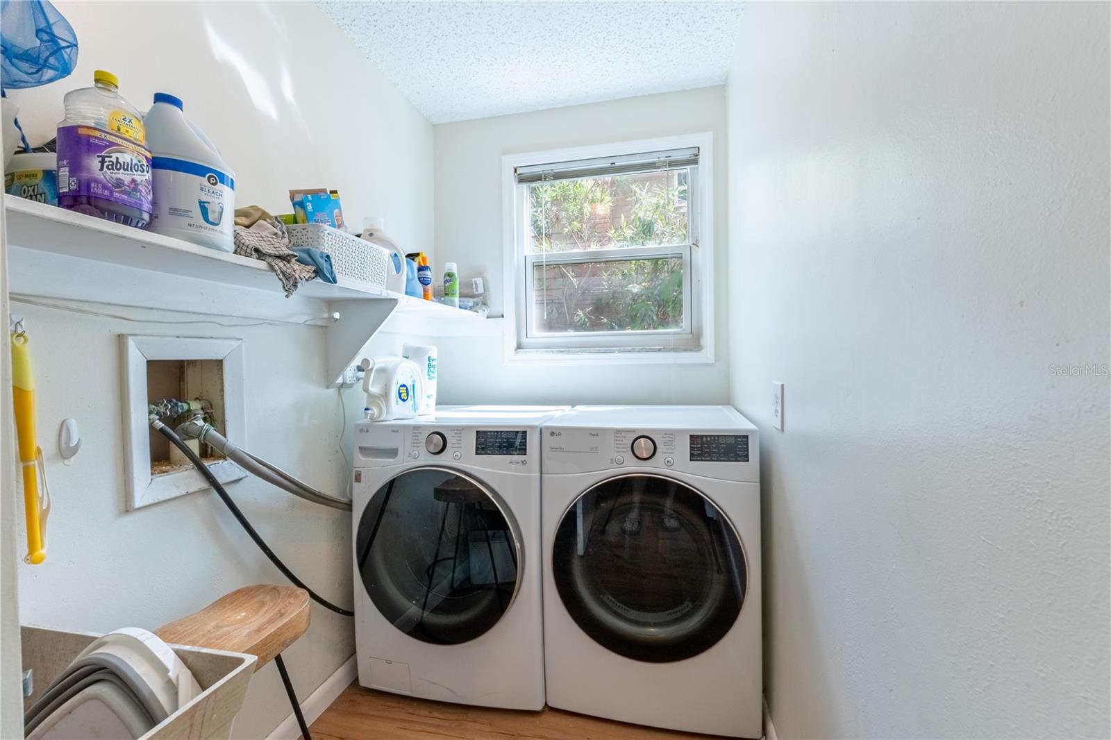 INSIDE UTILITY ROOM-WASHER AND DRYER INCLUDED