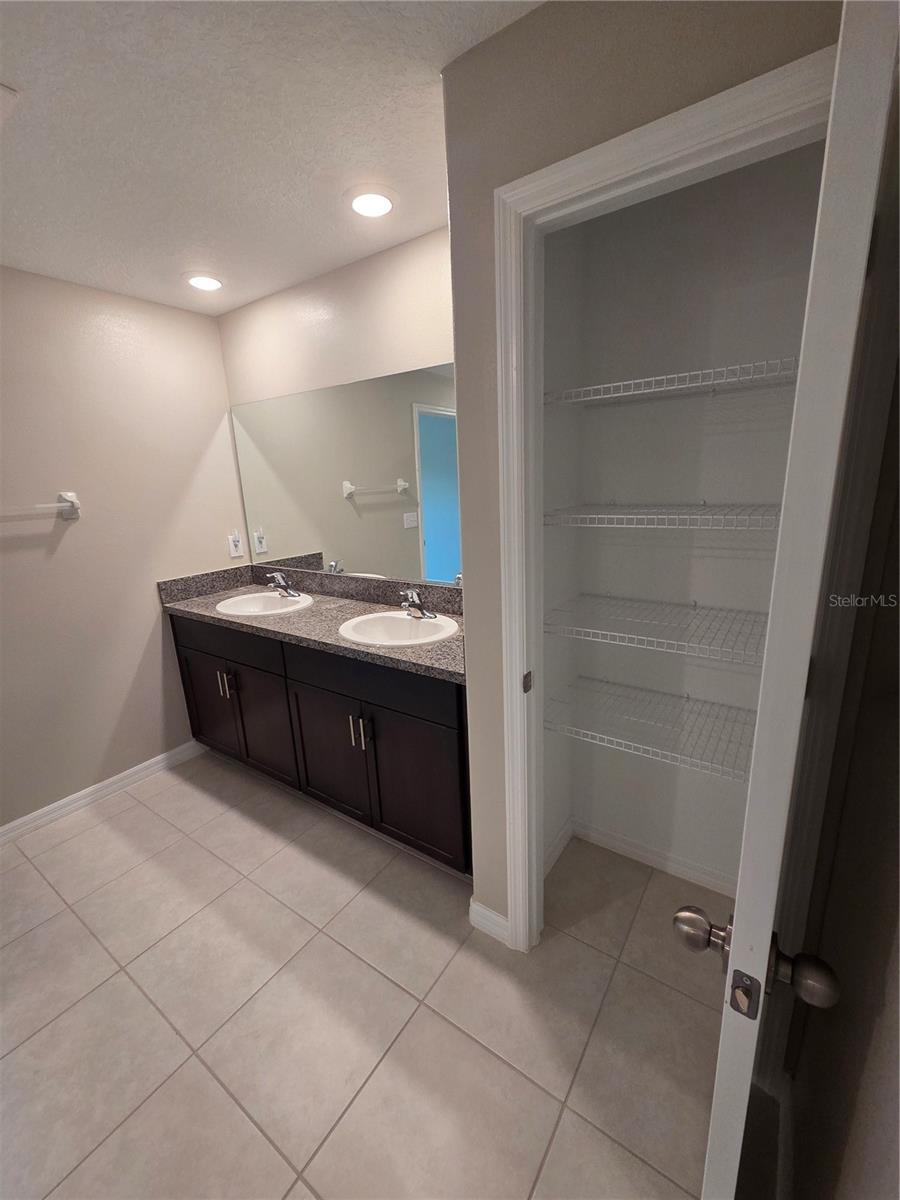 Dual Sinks and Linen Closet