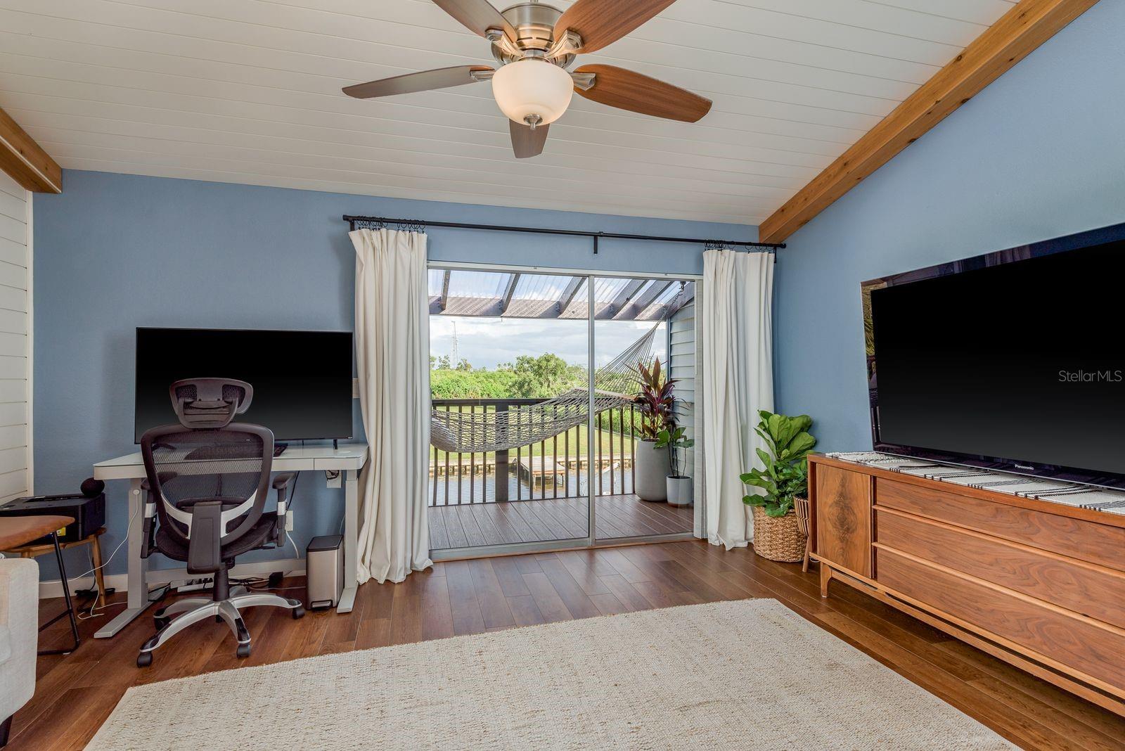 Traditional Master Bedroom w/ Balcony overlooking the water!