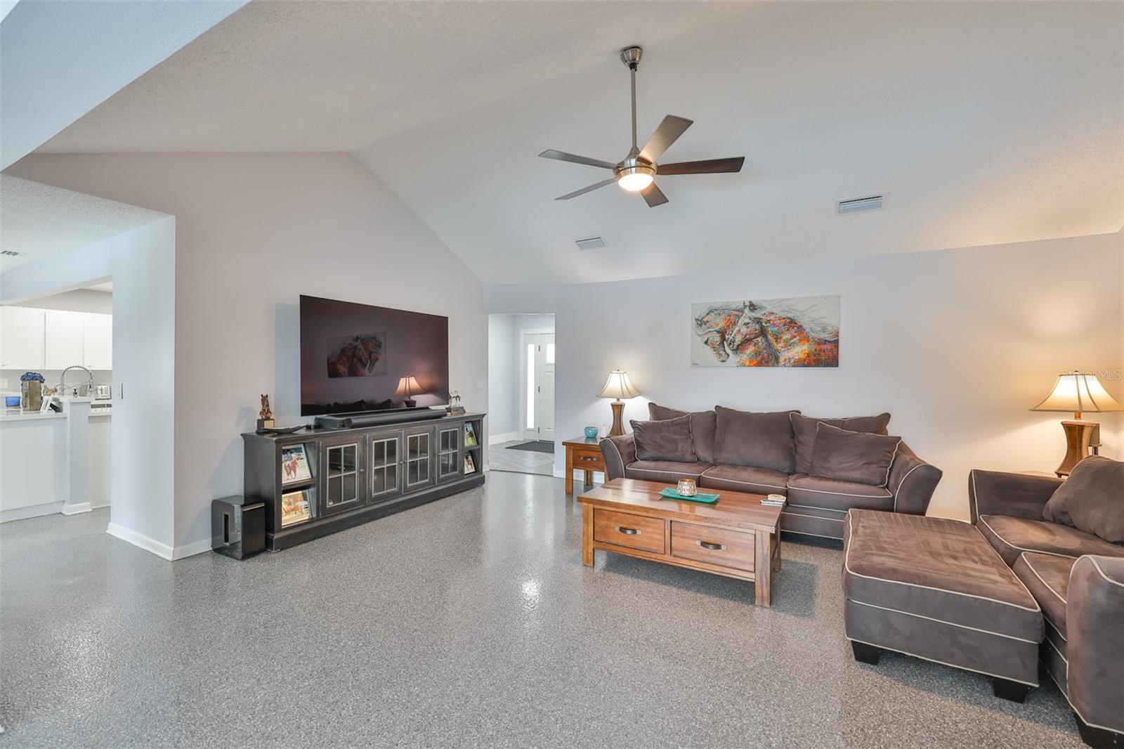 With an inviting floor plan that has a seamless flow to the outdoor living area is perfect for families and gatherings.
