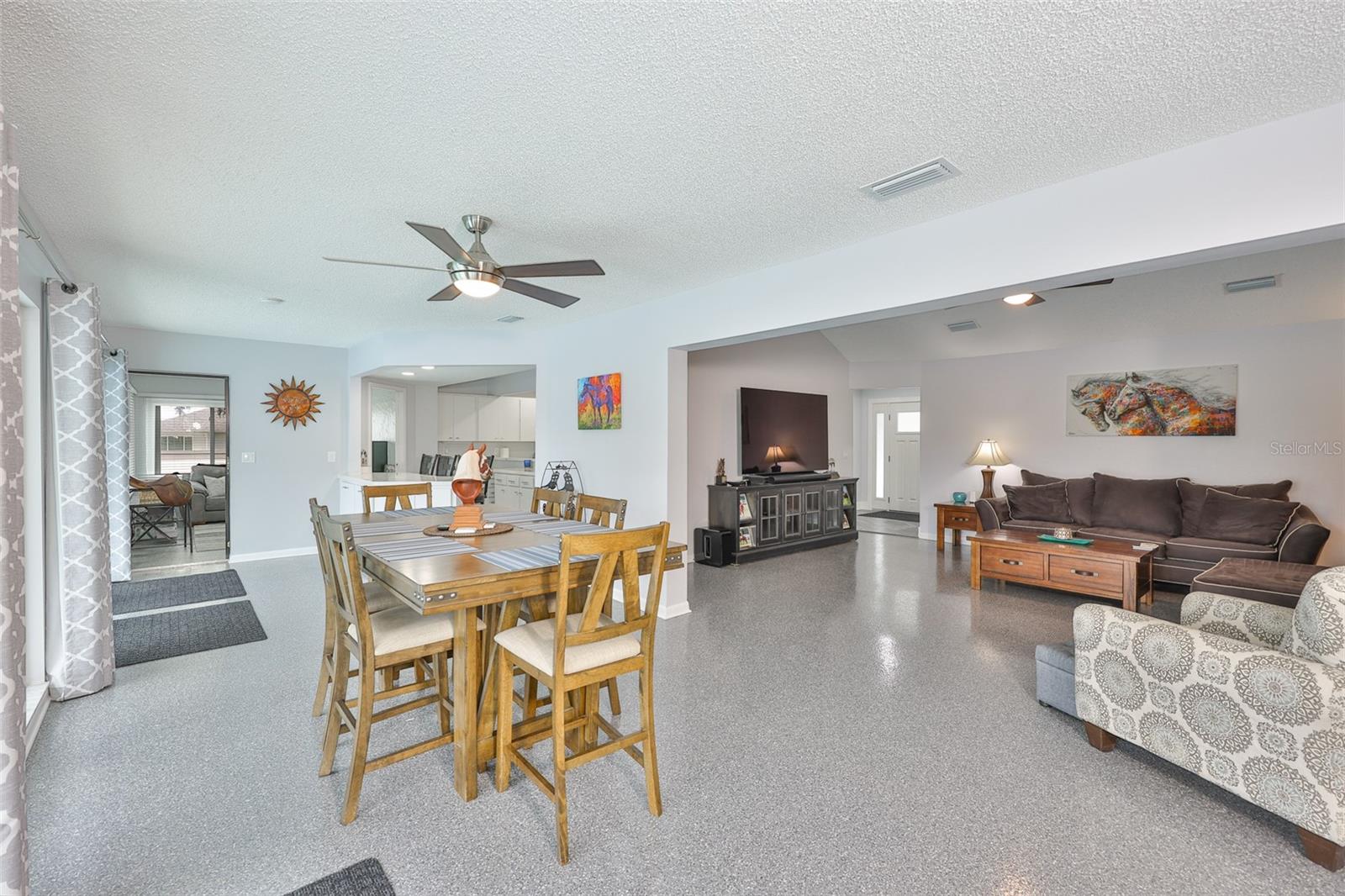 The clean and modern floorplan is open, spacious and perfect for families and entertaining.