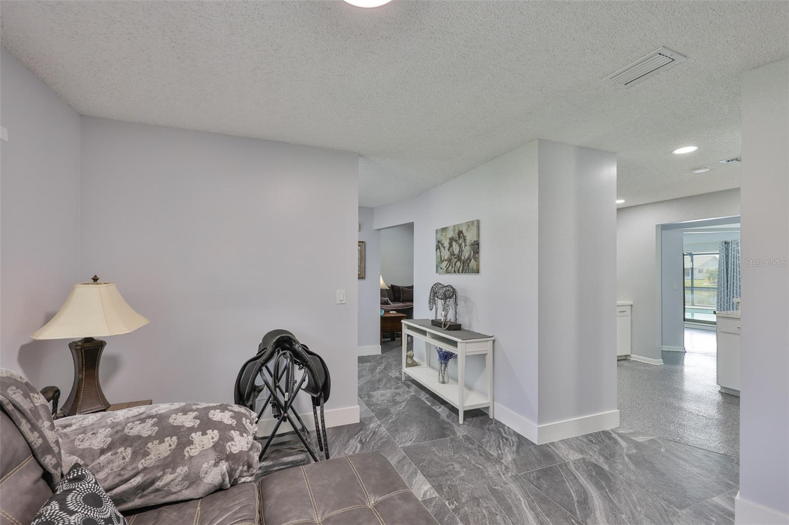 Recessed lighting throughout offers plenty of lighting.